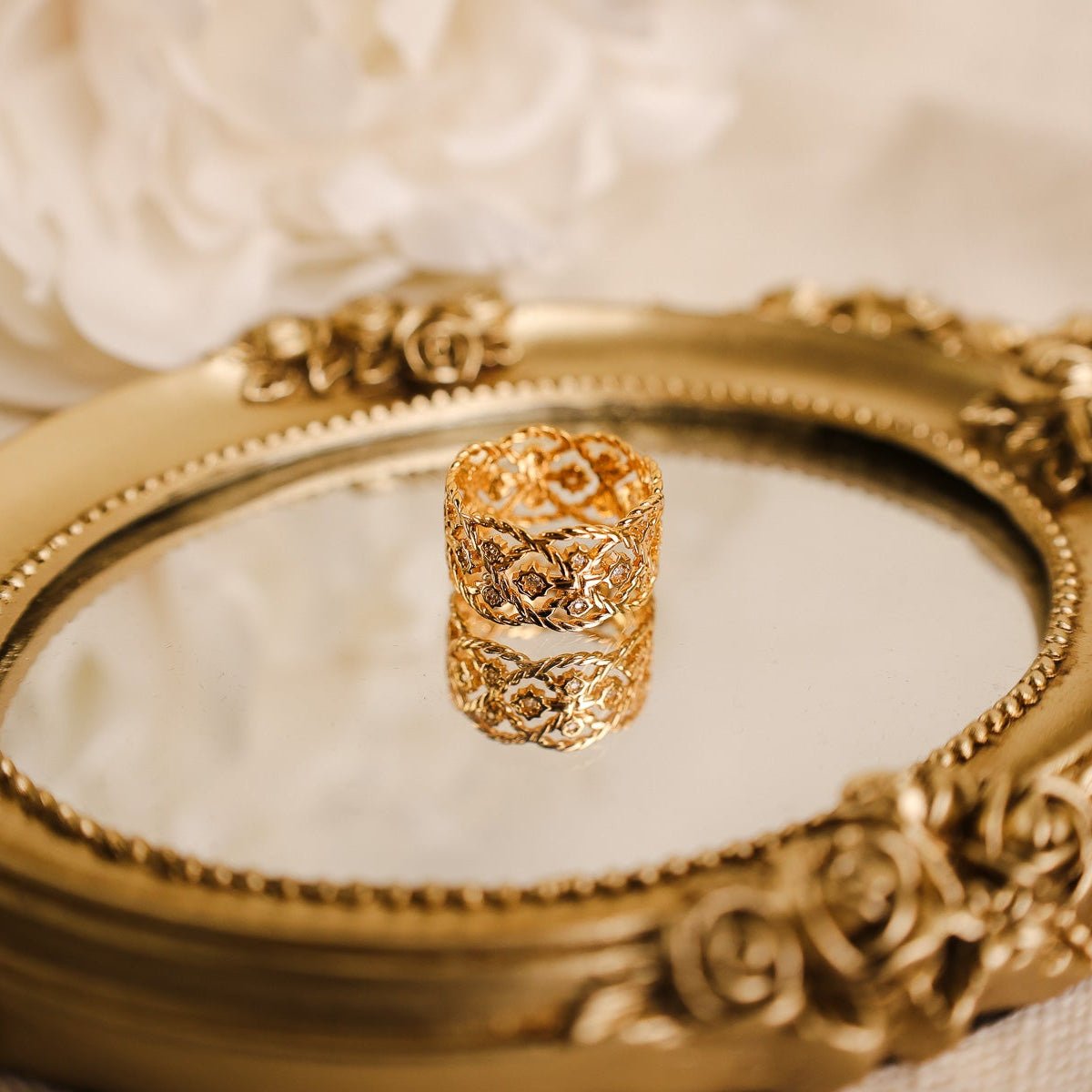 Anel Entrelaçado em Prata Dourada com Zircónias - Loja do Ouro