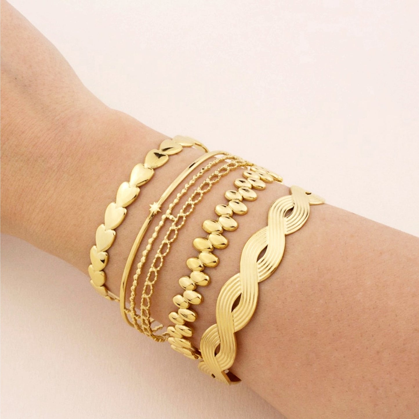 Pulseira Escrava em Aço Dourado com Corações - Loja do Ouro