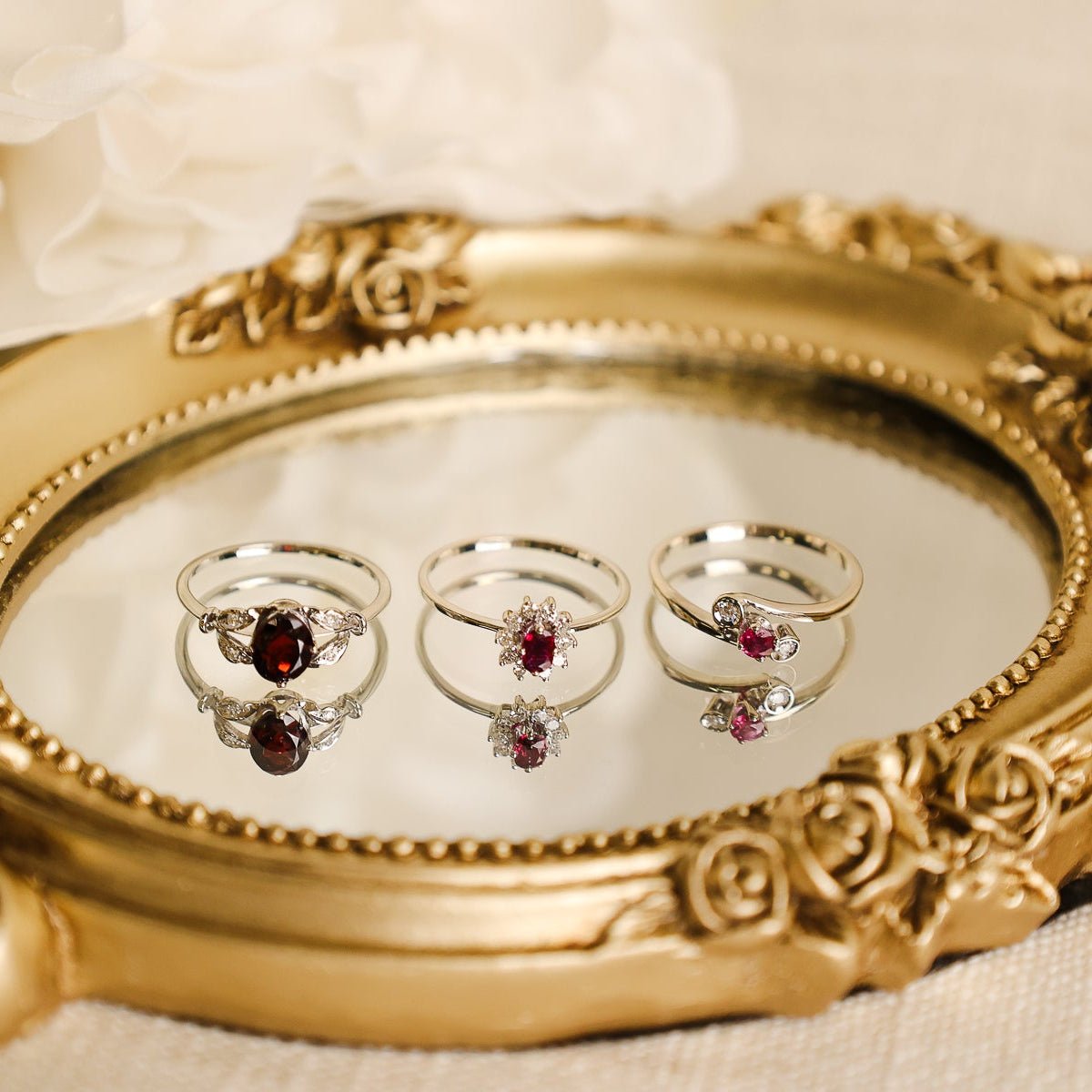 Anel Chuveiro em Ouro Branco com Rubi e Zircónias (T12) - Loja do Ouro