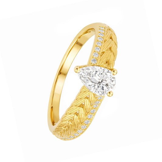 Anel Entrançado em Prata Dourada com Zircónia em Lágrima - Loja do Ouro