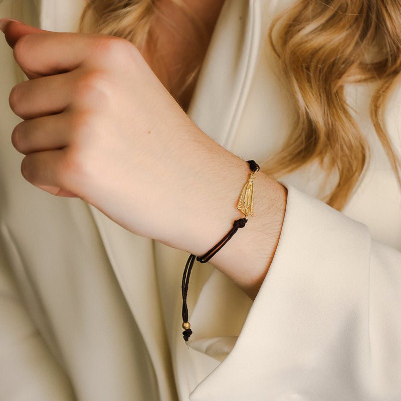 Pulseira Ajustável em Nylon com Medalha N Sra de Fátima em Prata Dourada - Loja do Ouro