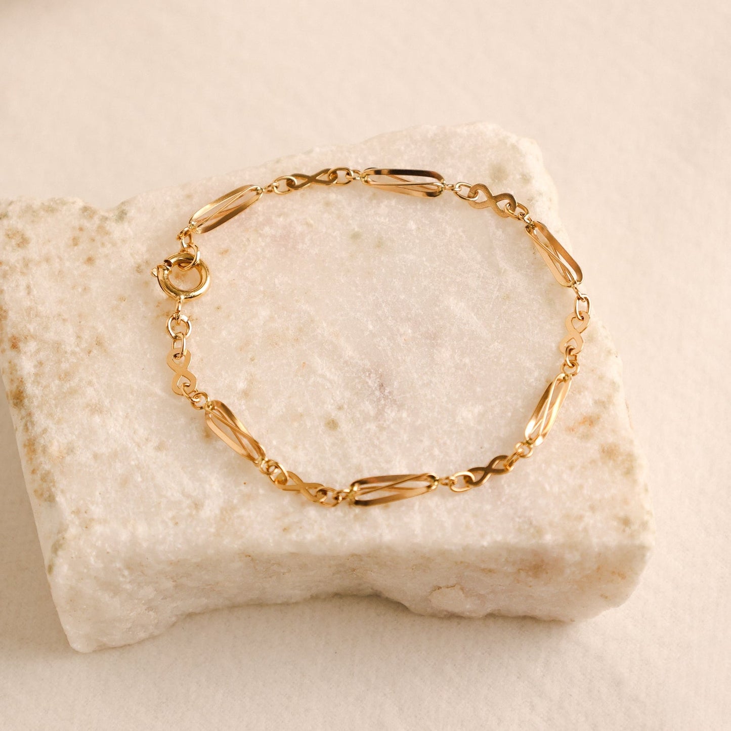 Pulseira com Rocas e Infinitos em Ouro 19kl (18cm) - Loja do Ouro