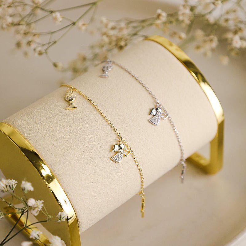 Pulseira em Prata Dourada e Zircónias adornada com Anjo, Cruz e Calice - Loja do Ouro