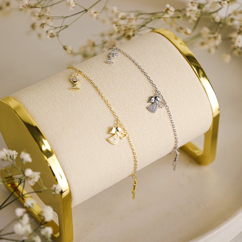 Pulseira em Prata e Zircónias adornada com Anjo, Cruz e Cálice - Loja do Ouro